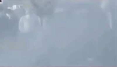 A protester in India, unmoved after being hit with a water cannon. (Sorry for video quality.)