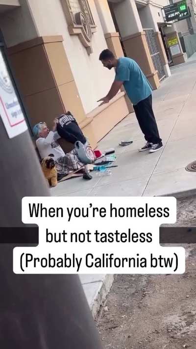 homeless man refuses to wear a Tottenham sweater😭