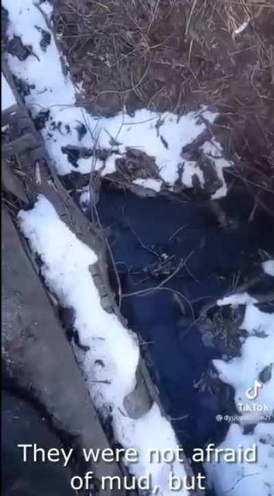 How two Russian tanks tried to cross the river and ... got stuck. And two more tried to pull them out ... and also got stuck.