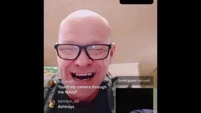 Asking people to touch my camera through the fence on Tik Tok live