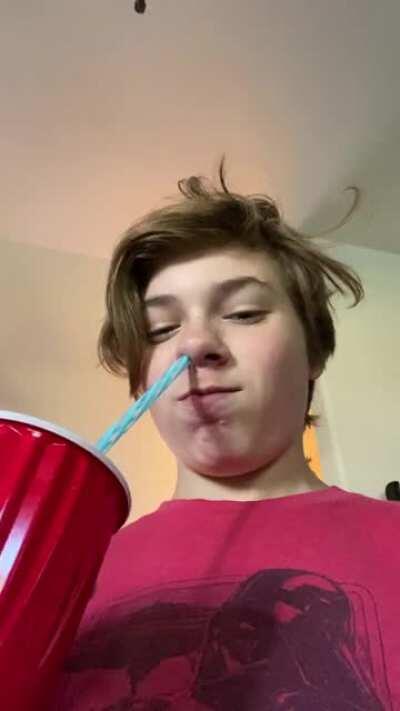 This kid tried to drink soda through his nose