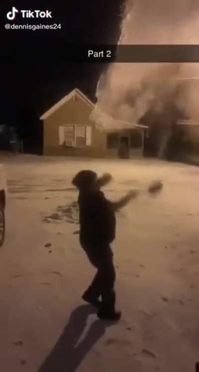 What happens when you throw boiling water in the air while its below freezing?