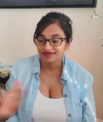 Deep teasing us with her tight tank top barely covering her massive tits 