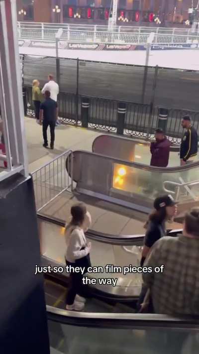 In Las Vegas it is forbidden to stop and watch Formula 1 without a ticket...
But no one said anything about going up and down an escalator