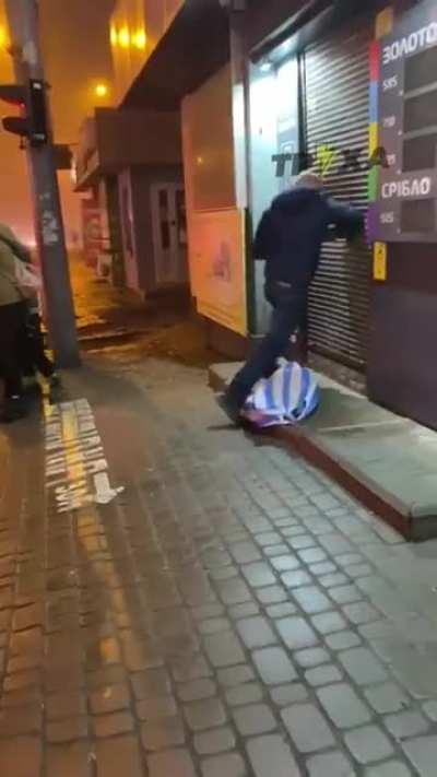 Guys fights a store.