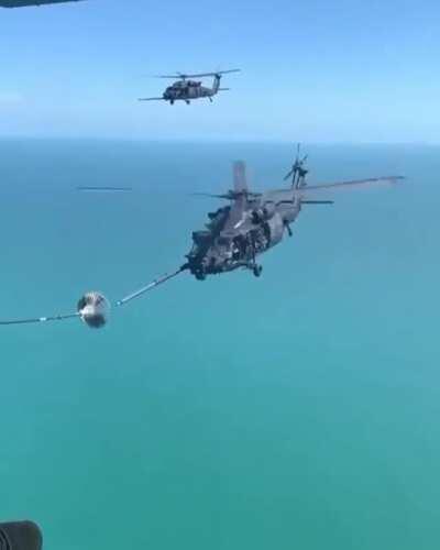 Helicopter mid air refuelling