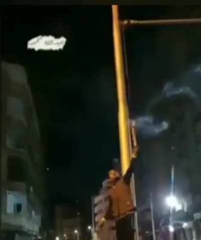 Checking his firecracker closely