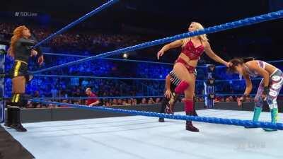 Charlotte telling Becky to kiss her ass