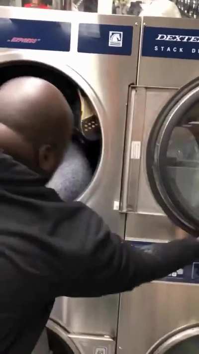 Deen the great gets thrown into washing machine by Shaq after throwing a cup of beer on him