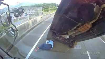 (Japan) Car accidently falls and crushes worker