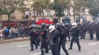 Riot Police Rush Crowd