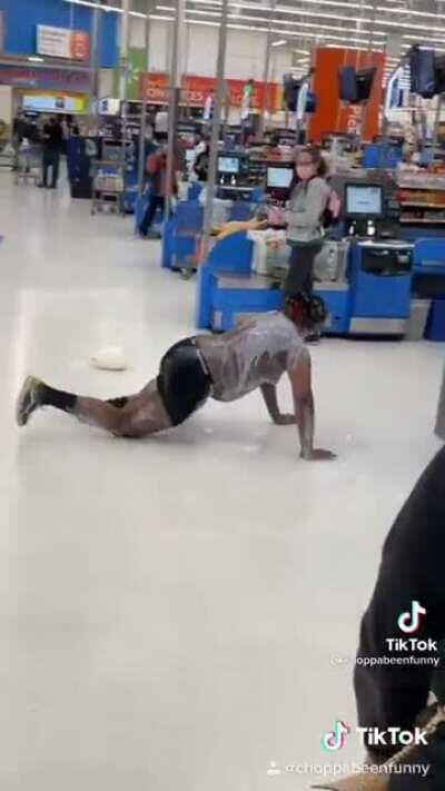 Guy pours milk on himself and yells at people in Walmart.
