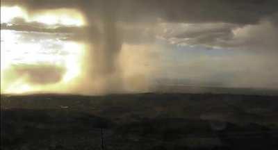 Microburst dumping thousands of gallons of rain on a city at once