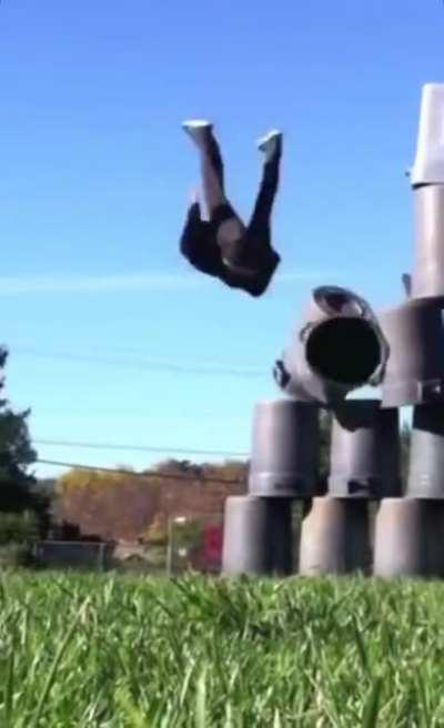 Backflip from pyramid of bins