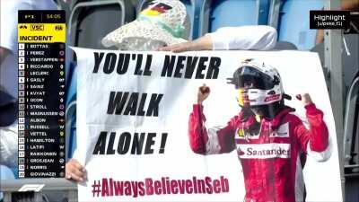 FP1: Seb fan with a You'll Never Walk Alone sign