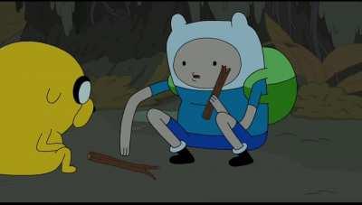 Finn and Jake get a fire going.