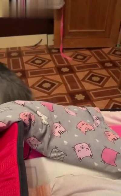 This lovely nanny is trying to stop the baby from crying