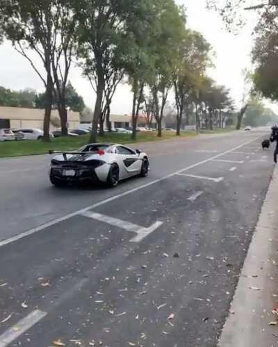 BMW M3 loses it and smacks curb leaving San Jose Car meet