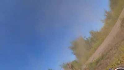 Ukrainian soldier falling of vehicle while driving fast under mortar fire near Bakhmut, summer 2023