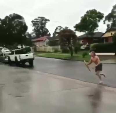 Trying to surf on a 'wet floor' sign...