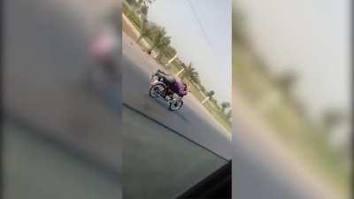 Guy Tries Stunt On Bike, Crashes Into Vehicle