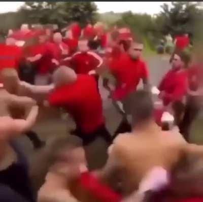 Flying kick starts this mass brawl.