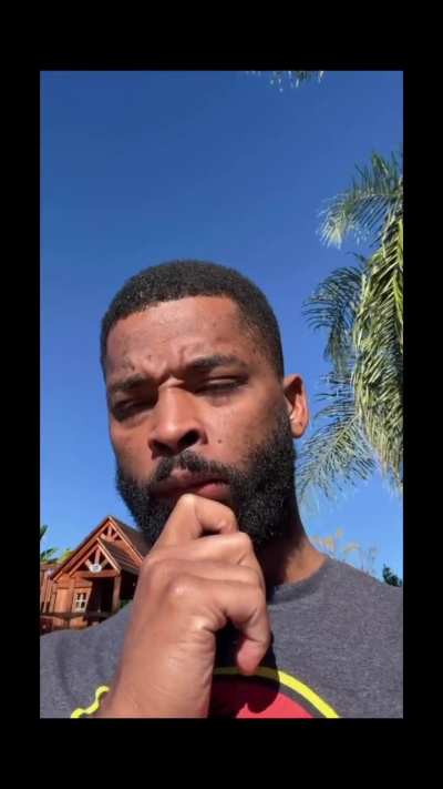 A buddy makes sure his friend can be seen in the picture