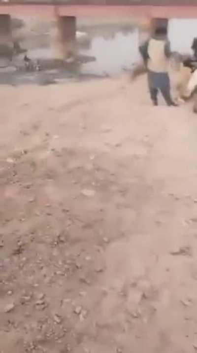 Unfortunate Pakistanis trying to get across an active railway bridge 