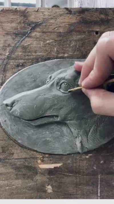 This is how I create one of my sculptures. This time it is a relief of a dachshund.