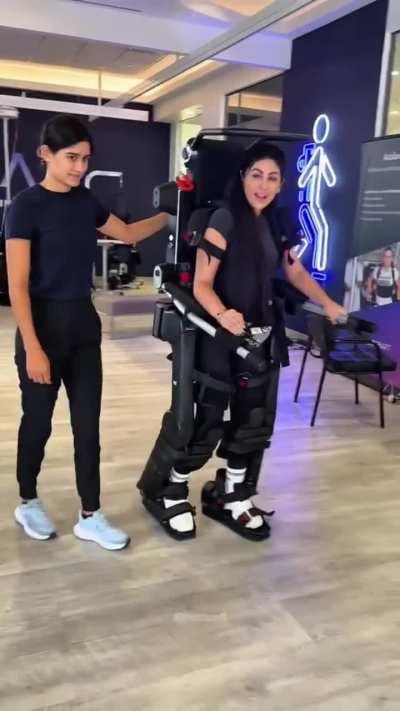 Exoskeleton helps a paralyzed woman experience walking for the first time in 10 years.