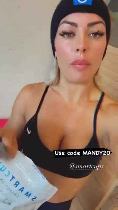 Mandy Rose shilling something