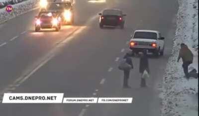 road rage driver randomly punching bystander