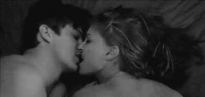 Passionately kissing