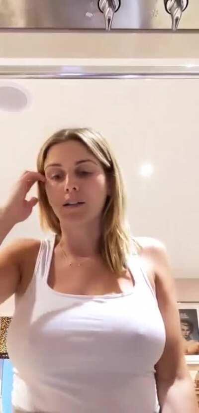 White top, no bra, rock-hard nipples.