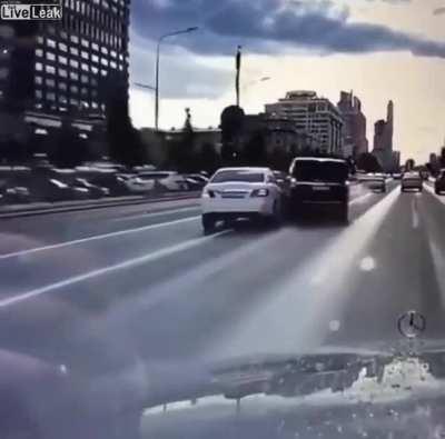 Car trying to push another off the road