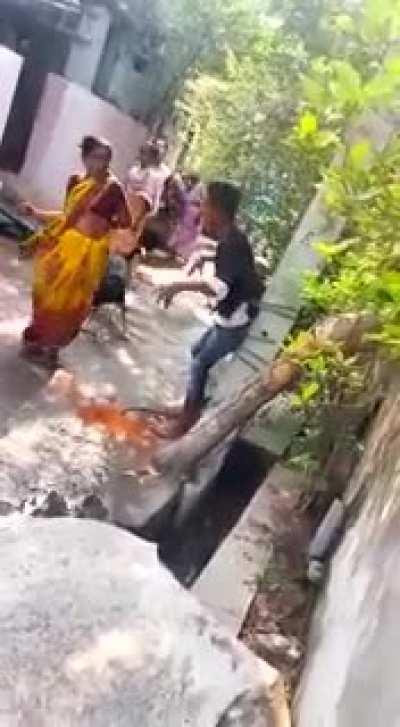 An Indian mother found out that her 15 yo son is addicted to drugs. she tied him to a pole and gave him a facial with chilli powder