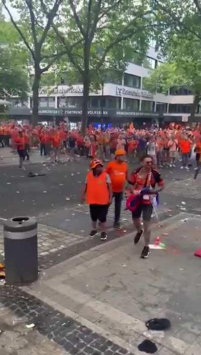 Dutch fans attacking a pub full of English fans