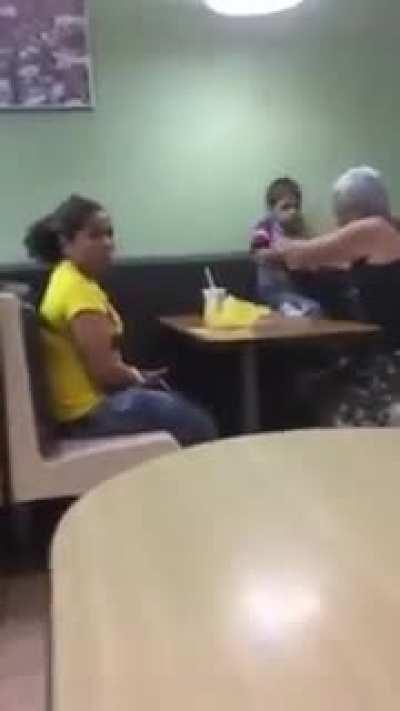 Kid acts up in McDonald's