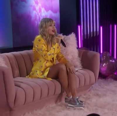 On couch answering questions