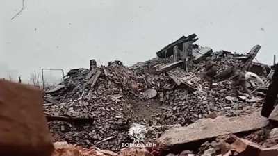 Two Ukrainian soldiers, under the cover of their comrades, are throwing captured TM-62 mines into the Russian positions in the ruins of Vovchansk, Kharkiv region. 34th Battalion, 57th Motorized Brigade. Published 12.09.2025