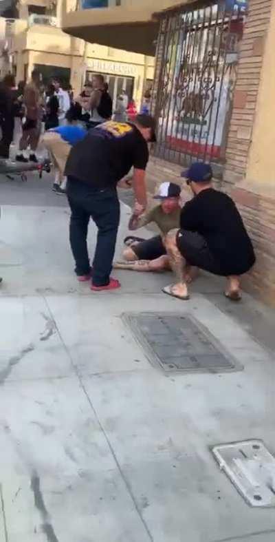 Guy screams “fuck you” to protestors. Protestors proceed to knock him out cold with no hesitation.(ORANGE COUNTY, CA)