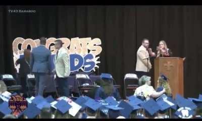 Superintendent attacked during the graduation; the unnamed attacker was a father who didn’t want his graduating daughter to shake the hand of a black man