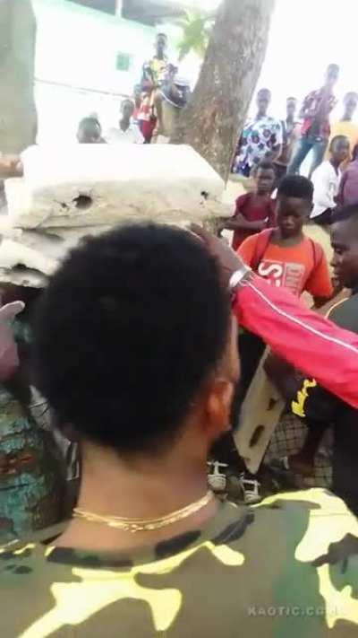 Thief is forced to hold a bunch of concrete bricks.