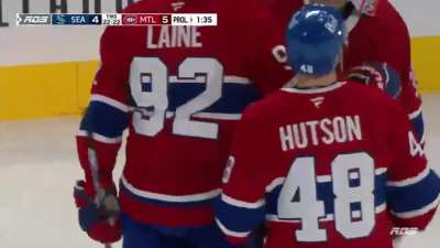 Cole Caufield snipes it from the goal line for the OT winner