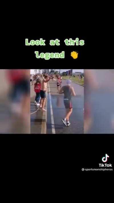 Man hoses down runners