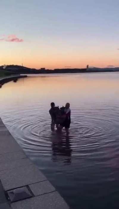 Bikers saving a kangaroo