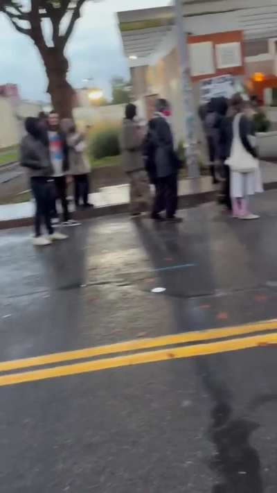 Anti Ice protestors in Portland mock agents, while dressed up in costumes and playing Yakety Sax