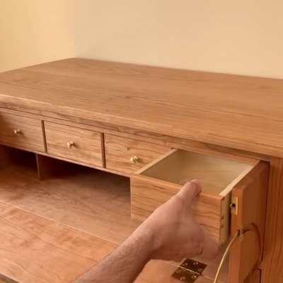 This handmade wooden desk with well-hidden secret compartments.