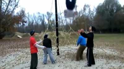 A backflip from the rope pyramid