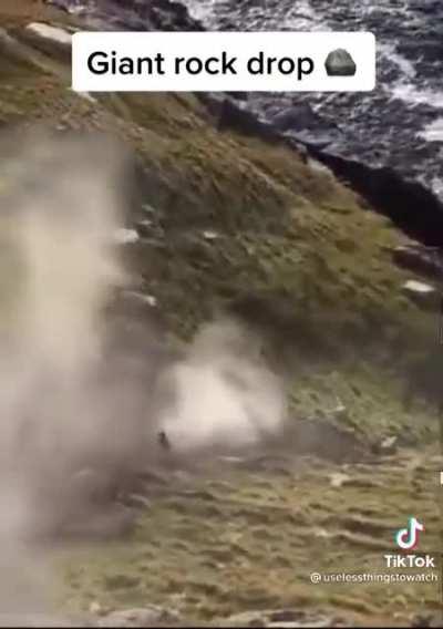 Rolling a giant rock down a hill